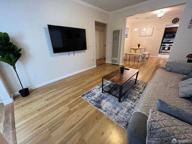 558 A St, Hayward, CA 94541 - living room with crown molding, wood finished floors, and baseboards