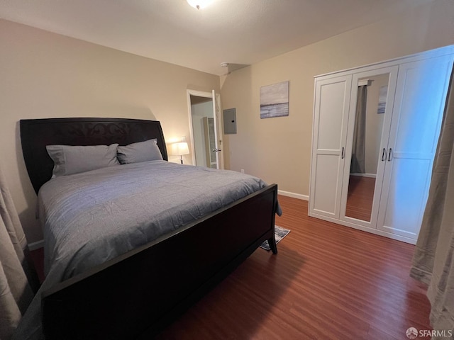 558 A St, Hayward, CA 94541 - bedroom featuring electric panel, baseboards, and wood finished floors