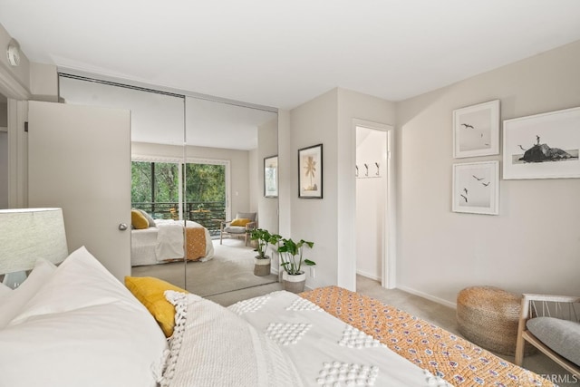 bedroom with a closet and carpet floors