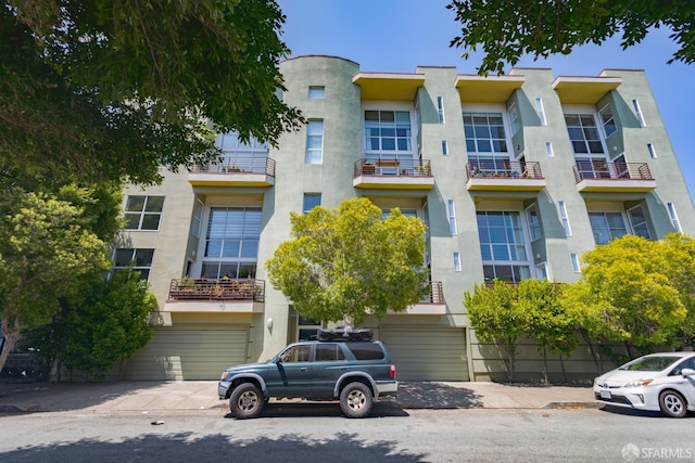 3118 18th St Unit 2, San Francisco, CA 94110 - view of apartment building / complex with an attached garage