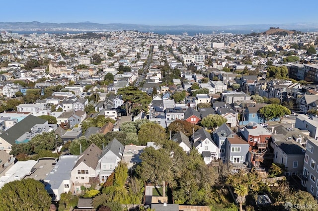 birds eye view of property with a mountain view