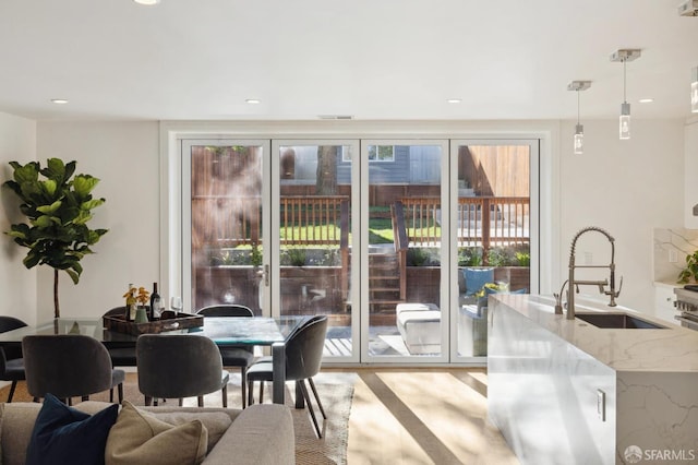 dining area featuring sink