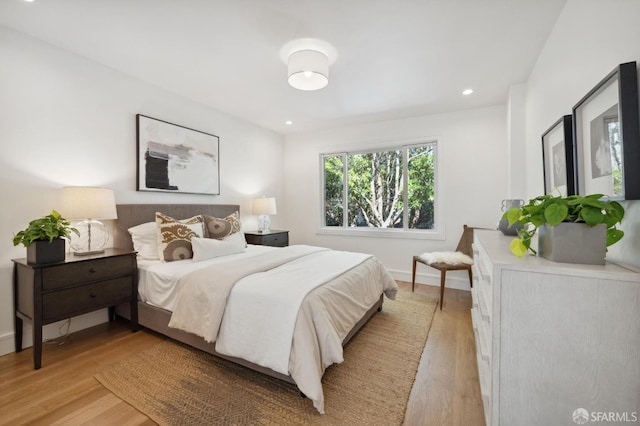 bedroom featuring light hardwood / wood-style floors