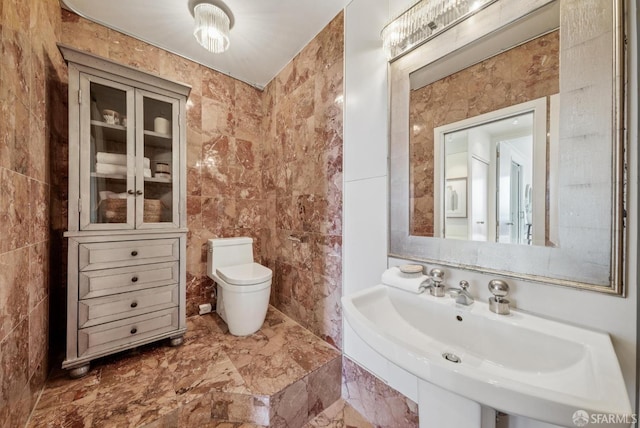 999 Green St Unit 1403, San Francisco, CA 94133 - bathroom featuring tile walls and toilet