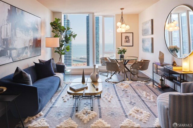 488 Folsom St Unit 4506, San Francisco, CA 94105 - living area featuring baseboards, wood finished floors, and a chandelier