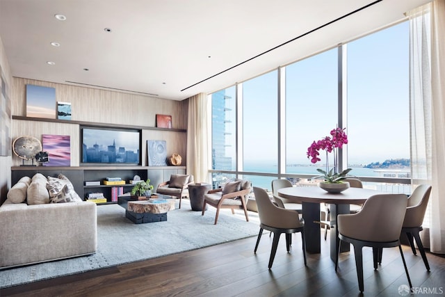 488 Folsom St Unit 4506, San Francisco, CA 94105 - dining space with floor to ceiling windows and wood finished floors