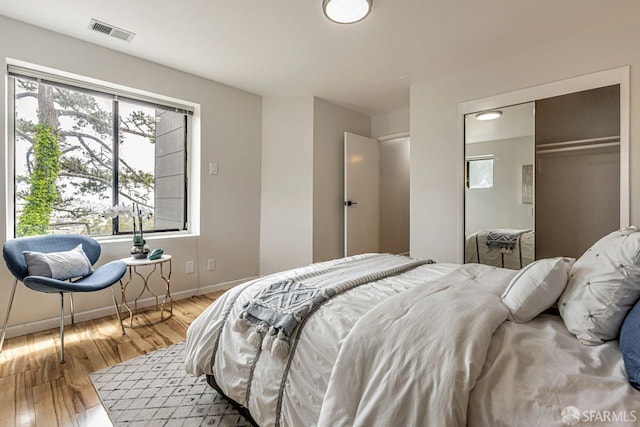 901 Teresita Blvd, San Francisco, CA 94127 - bedroom with multiple windows, light wood-style floors, and a closet