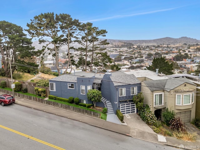 901 Teresita Blvd, San Francisco, CA 94127 - view of front of house with a residential view, a mountain view, a garage, and stucco siding