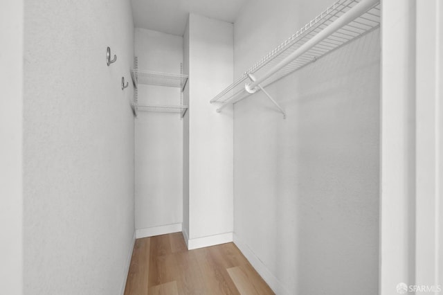 201 Harrison St Unit 302, San Francisco, CA 94105 - walk in closet with wood finished floors