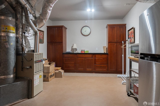 kitchen featuring freestanding refrigerator