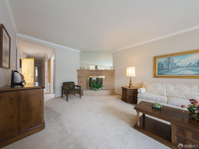 living area with carpet floors, a brick fireplace, and ornamental molding