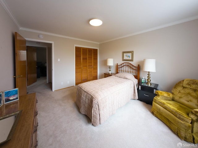 bedroom featuring a closet, light carpet, and crown molding