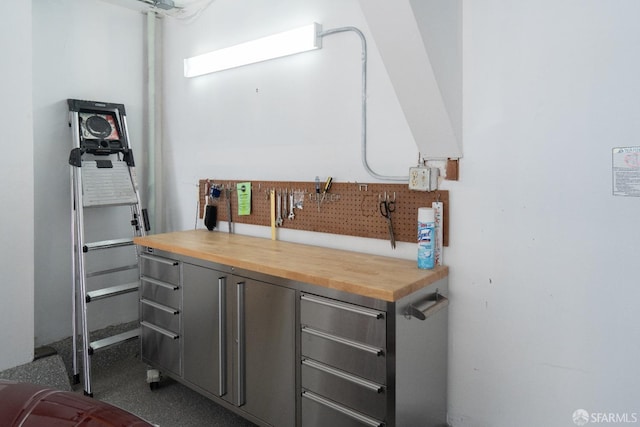 interior space featuring gray cabinets and butcher block counters