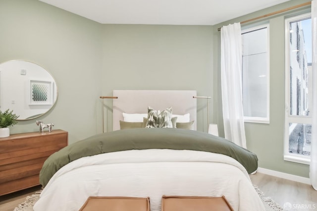 bedroom featuring light wood-type flooring