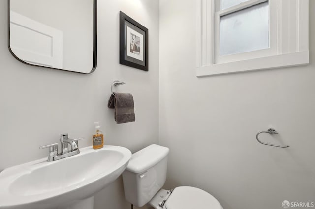 bathroom featuring a sink and toilet