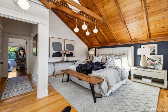 bedroom with beam ceiling, high vaulted ceiling, wooden ceiling, and light wood-type flooring