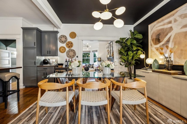 dining area featuring crown molding and dark hardwood / wood-style floors