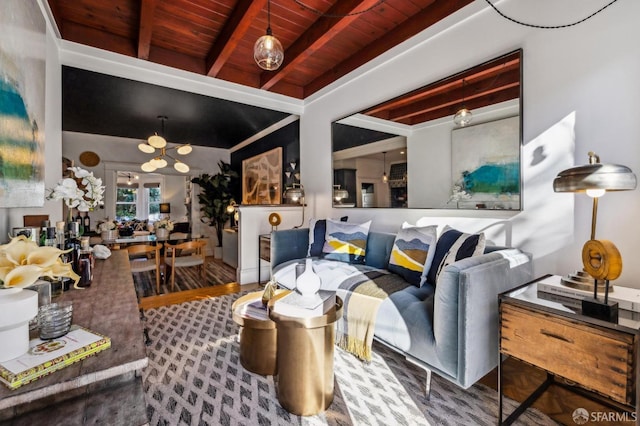 living room with beamed ceiling, wood ceiling, and a chandelier