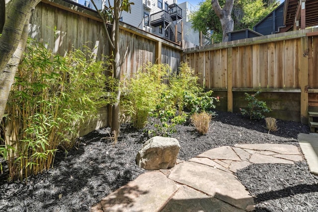 view of yard featuring a fenced backyard