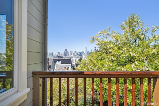 balcony featuring a city view