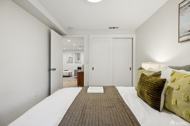 835 Diamond St, San Francisco, CA 94114 - bedroom featuring a closet, recessed lighting, and wood finished floors