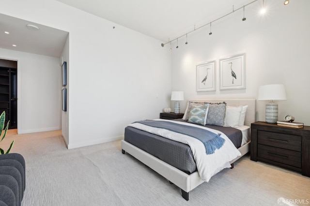 401 Harrison St Unit 45C, San Francisco, CA 94105 - bedroom featuring light colored carpet, baseboards, track lighting, and recessed lighting