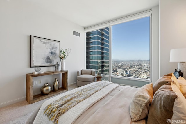 401 Harrison St Unit 45C, San Francisco, CA 94105 - bedroom featuring carpet floors, baseboards, and a city view