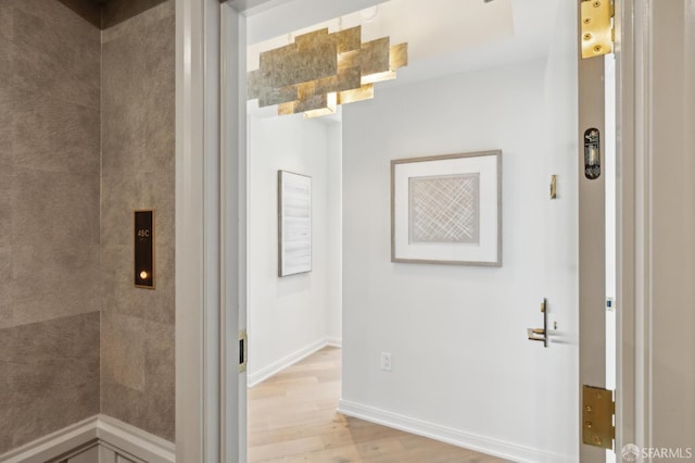 401 Harrison St Unit 45C, San Francisco, CA 94105 - bathroom featuring wood finished floors and baseboards
