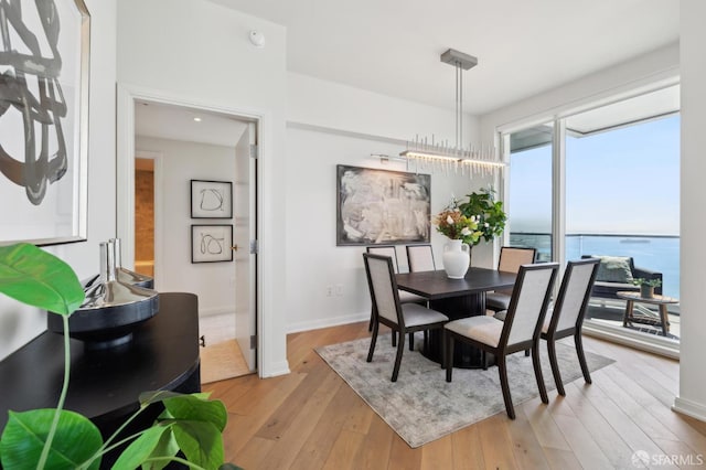 401 Harrison St Unit 45C, San Francisco, CA 94105 - dining room featuring light wood-style flooring and baseboards