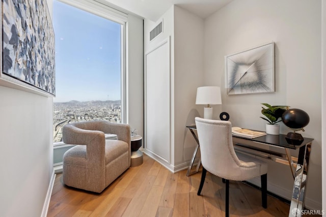 401 Harrison St Unit 45C, San Francisco, CA 94105 - office area with wood-type flooring and baseboards