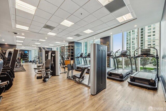 401 Harrison St Unit 45C, San Francisco, CA 94105 - workout area with a wall of windows and wood finished floors