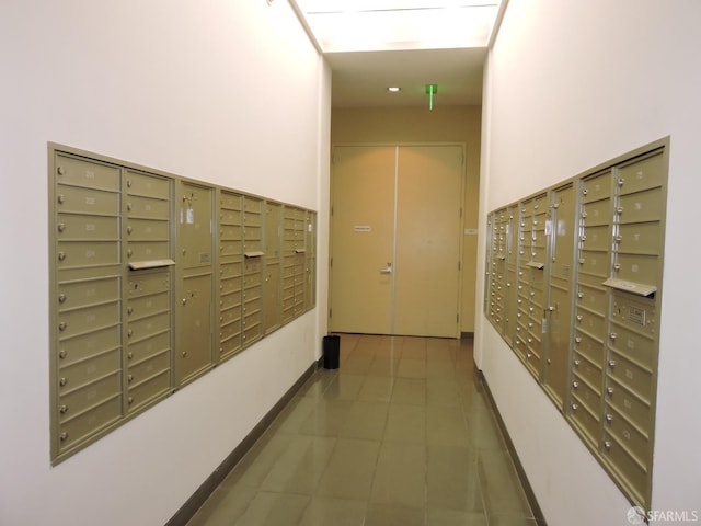 view of home's community featuring mail boxes