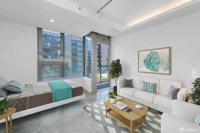 766 Harrison St Unit 403, San Francisco, CA 94107 - bedroom with concrete flooring, track lighting, access to outside, recessed lighting, and floor to ceiling windows