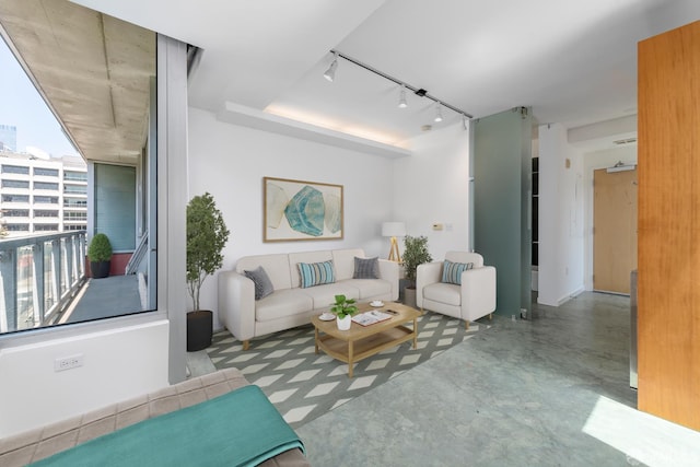 766 Harrison St Unit 403, San Francisco, CA 94107 - living room with track lighting and finished concrete flooring