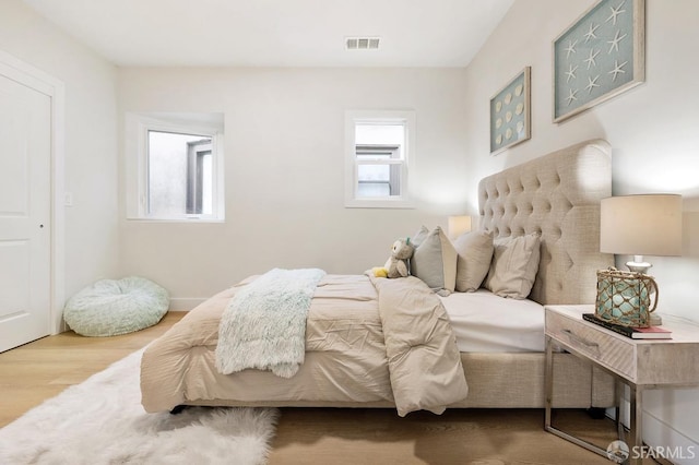 bedroom featuring hardwood / wood-style floors