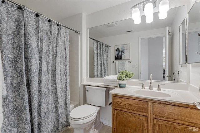 bathroom with toilet, vanity, visible vents, and shower / tub combo with curtain