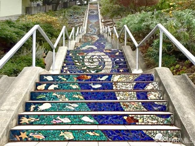 view of yard featuring stairway