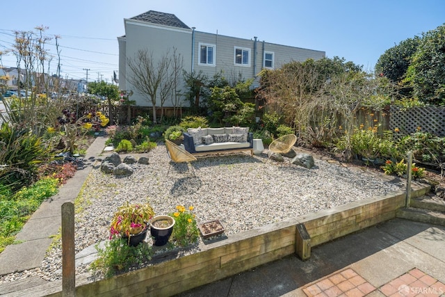 view of yard featuring an outdoor hangout area, a patio, and a fenced backyard