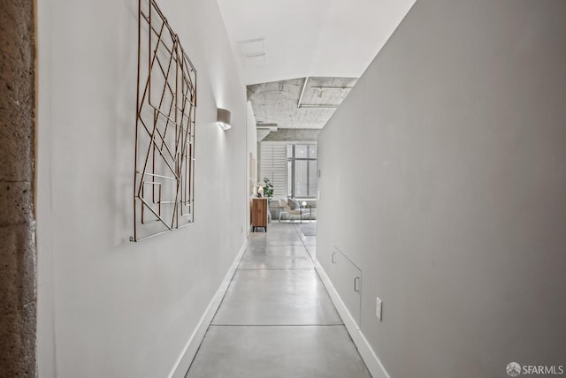 300 Beale St Unit 504, San Francisco, CA 94105 - hallway featuring baseboards and finished concrete flooring