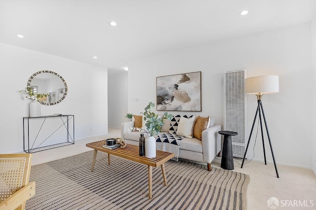 carpeted living room featuring a heating unit, recessed lighting, and baseboards