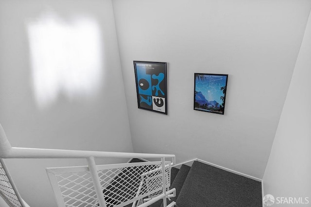 stairway with baseboards