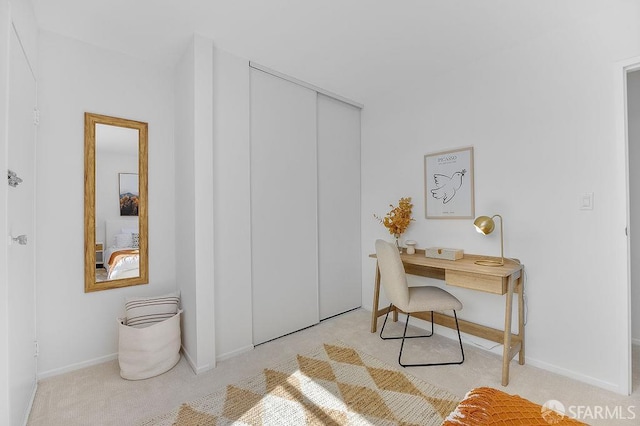 office featuring carpet and baseboards