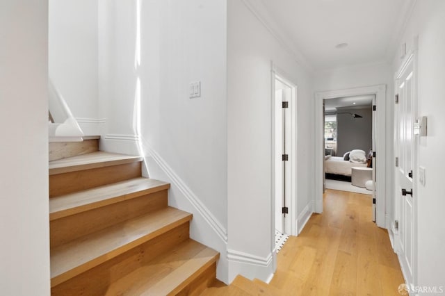 stairs with wood finished floors