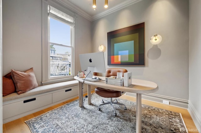 office featuring crown molding, baseboards, and wood finished floors