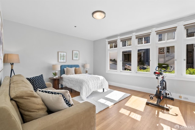 2195 Green St Unit 2, San Francisco, CA 94123 - bedroom featuring baseboards and wood finished floors