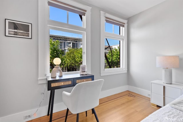 2195 Green St Unit 2, San Francisco, CA 94123 - home office with baseboards and light wood-style flooring