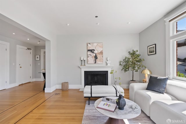 2195 Green St Unit 2, San Francisco, CA 94123 - living area with recessed lighting, baseboards, light wood-style flooring, and a fireplace