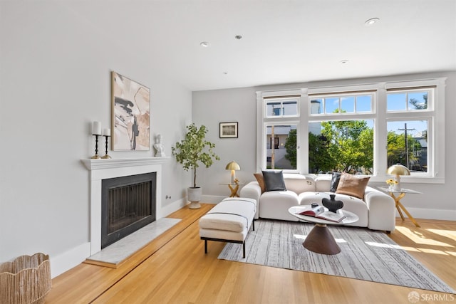 2195 Green St Unit 2, San Francisco, CA 94123 - living area featuring baseboards, a fireplace, recessed lighting, and wood finished floors