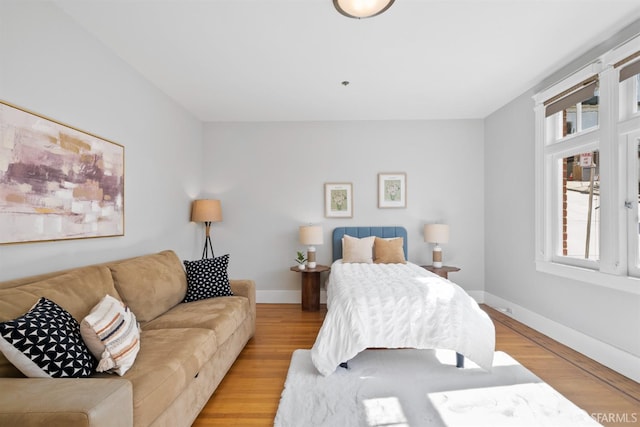 2195 Green St Unit 2, San Francisco, CA 94123 - bedroom with baseboards and wood finished floors