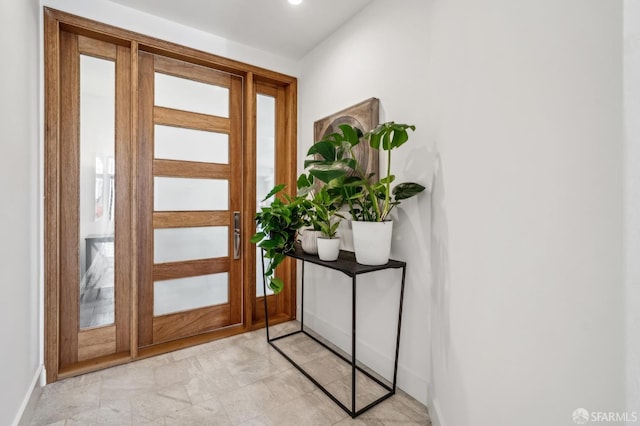 foyer with baseboards